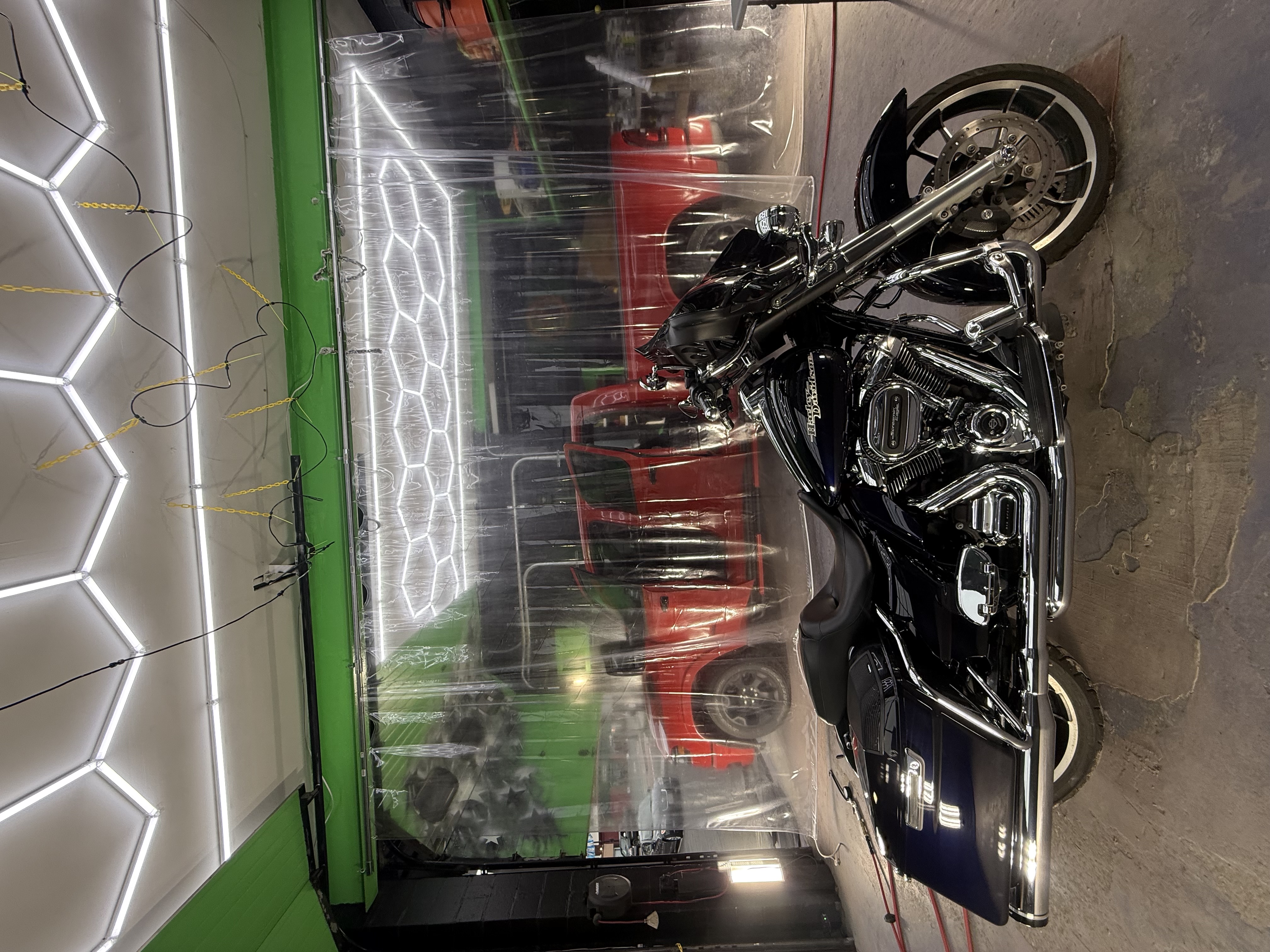 Harley Davidson motorcycle detailing in garage
